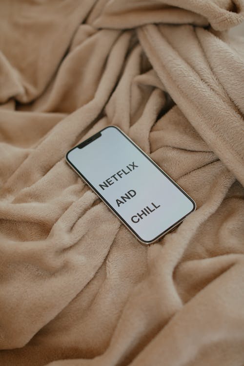 A Smartphone on the Bed