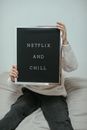 Person Holding Black and White Book