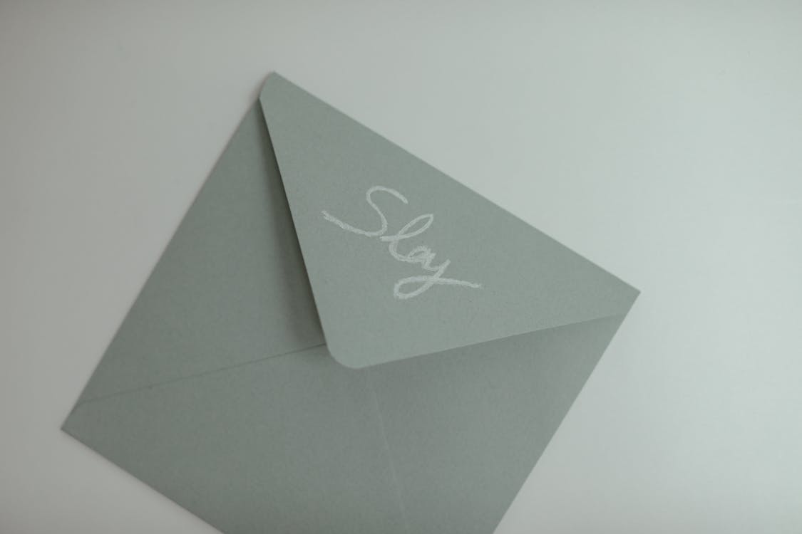 Close Up of Envelope with Word Slay
