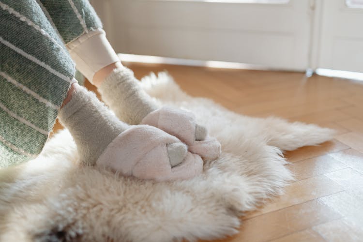 Woman Wearing Warm Socks And Slippers