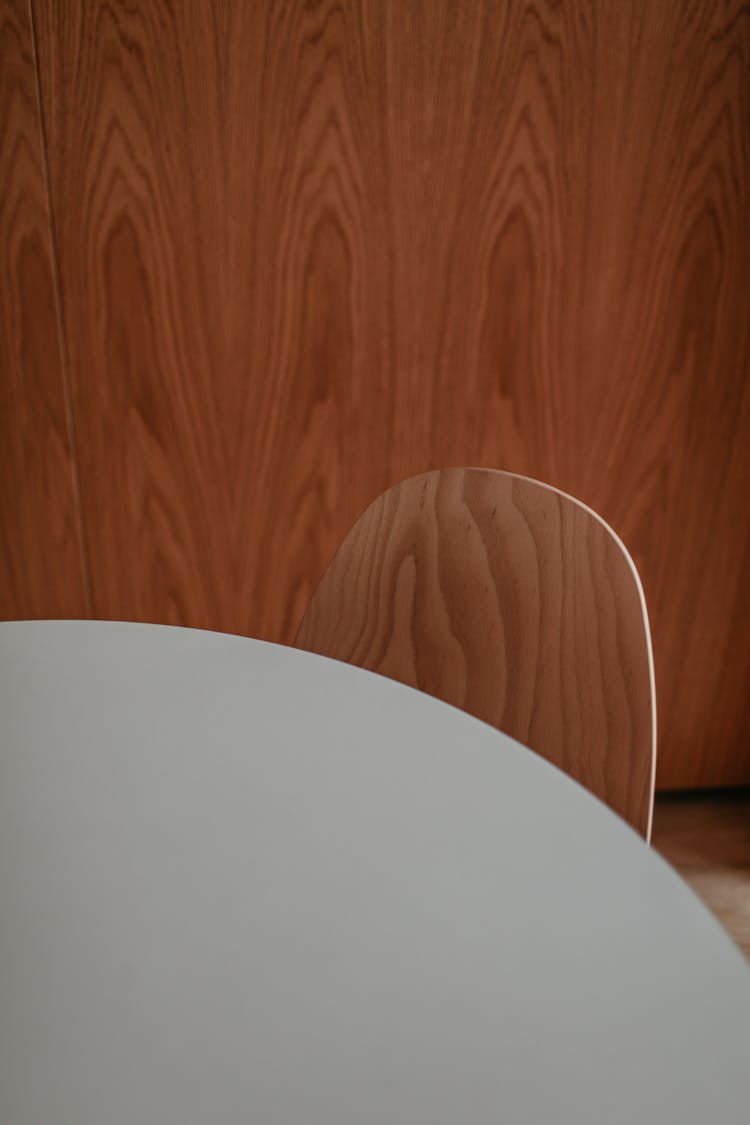 White Table And An Oak Chair