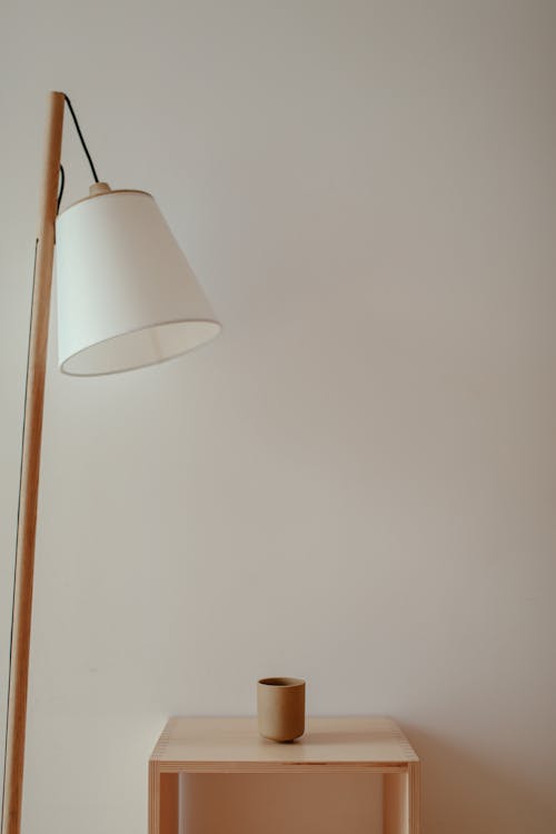 Brown Cup on the Wooden Table