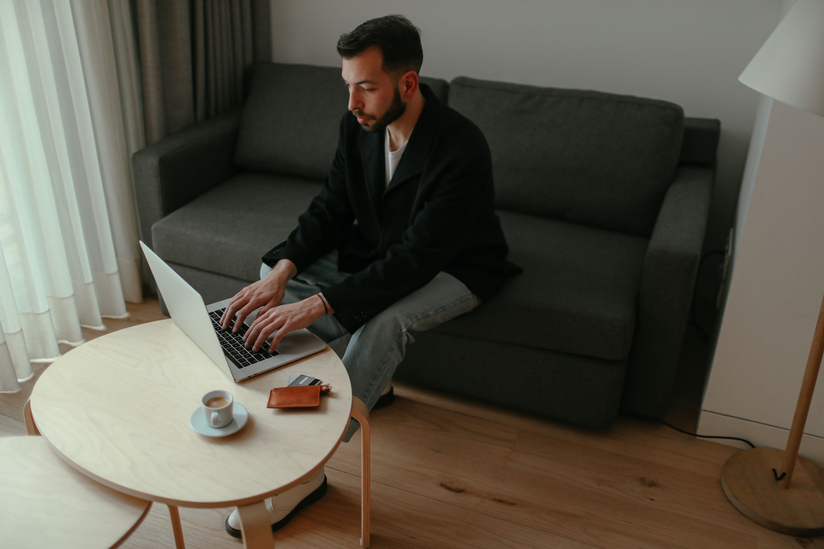 Shopper browsing products online from a sofa