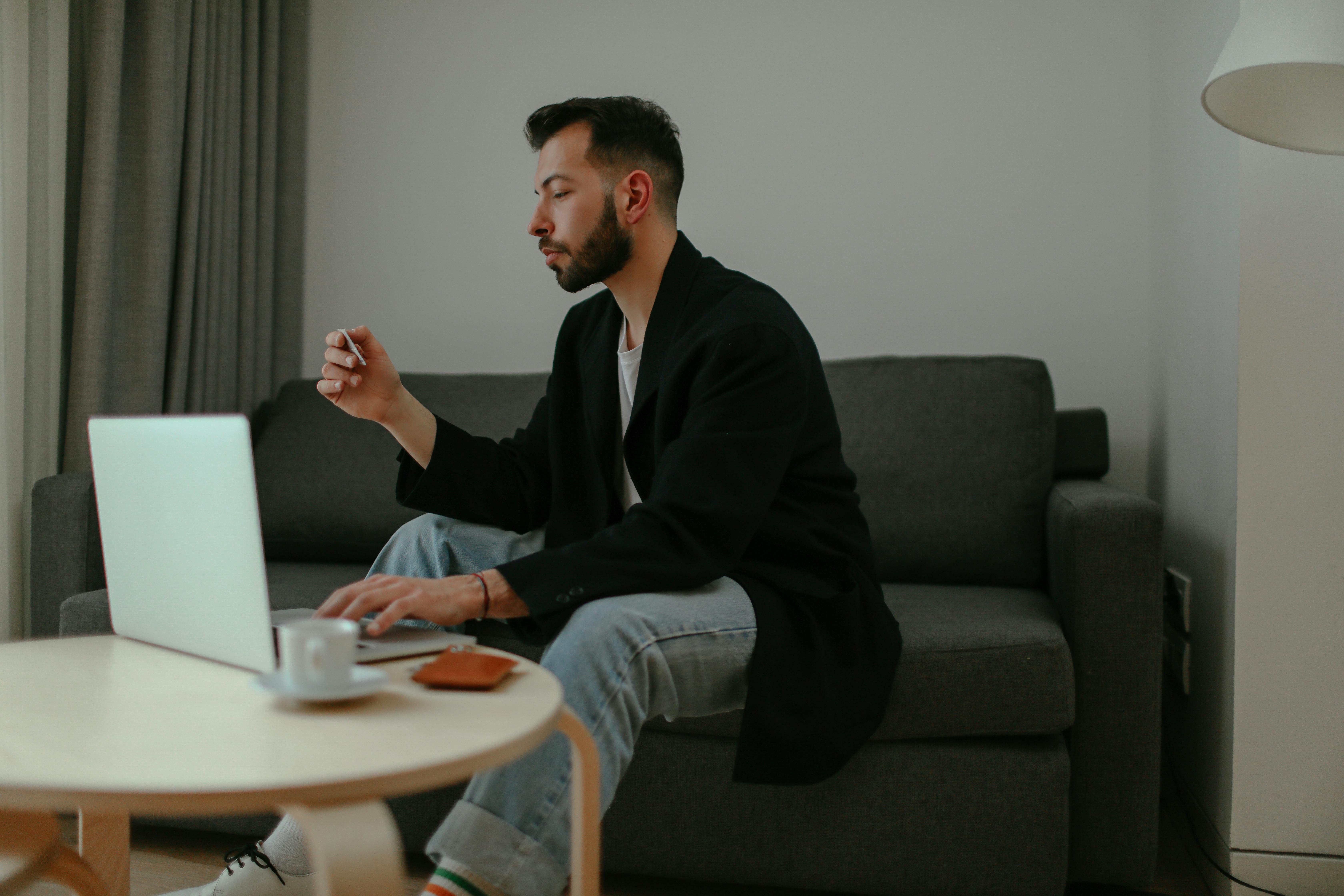 Person using a foldable table in a home office for neck pain relief