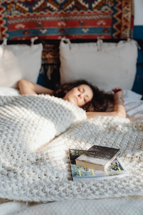 Free Books on a Knitted Blanket Stock Photo