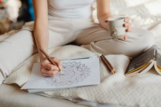 Woman Relaxing and Colouring 
