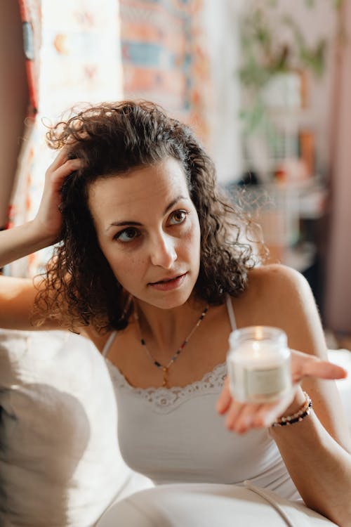 Free Woman Holding a Candle Stock Photo