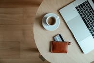 White Ceramic Mug on White Round Table