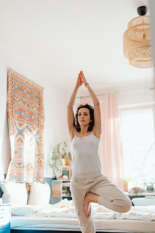 Woman Doing Yoga at Home