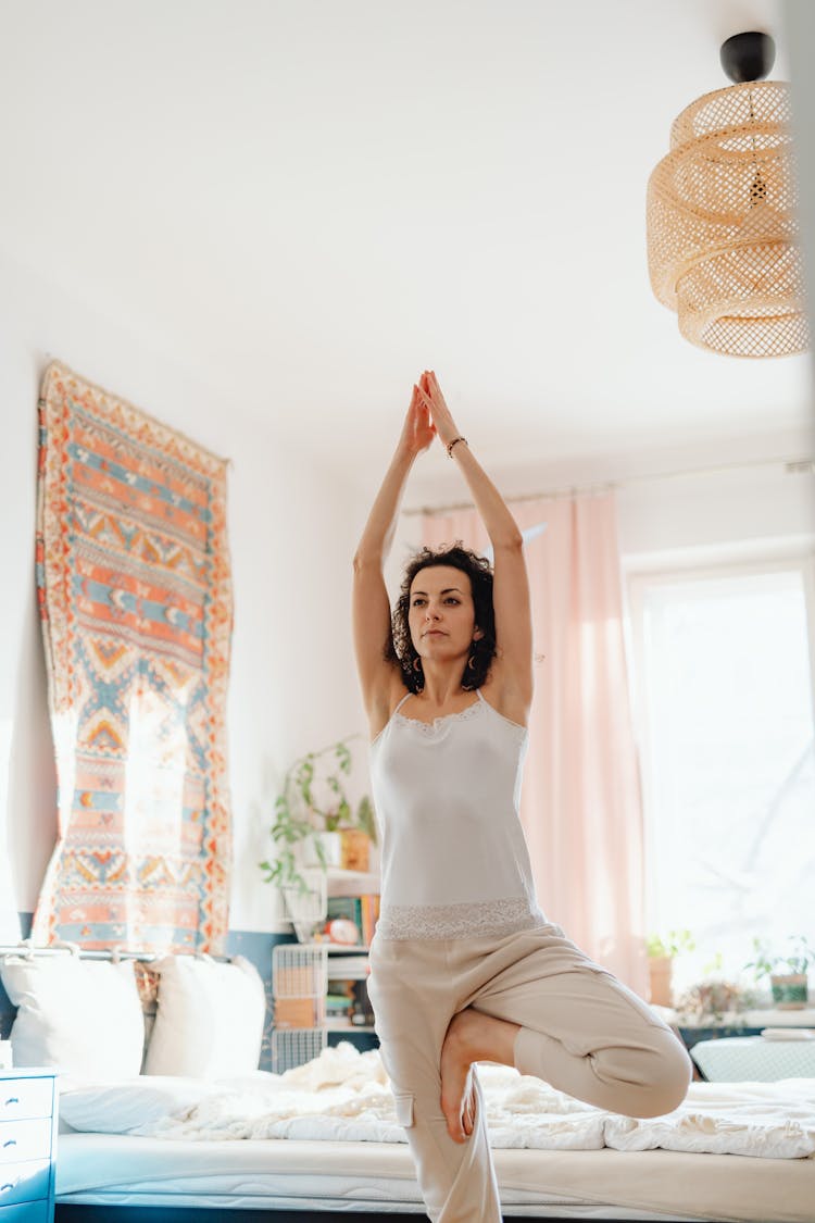 Woman Doing Yoga At Home