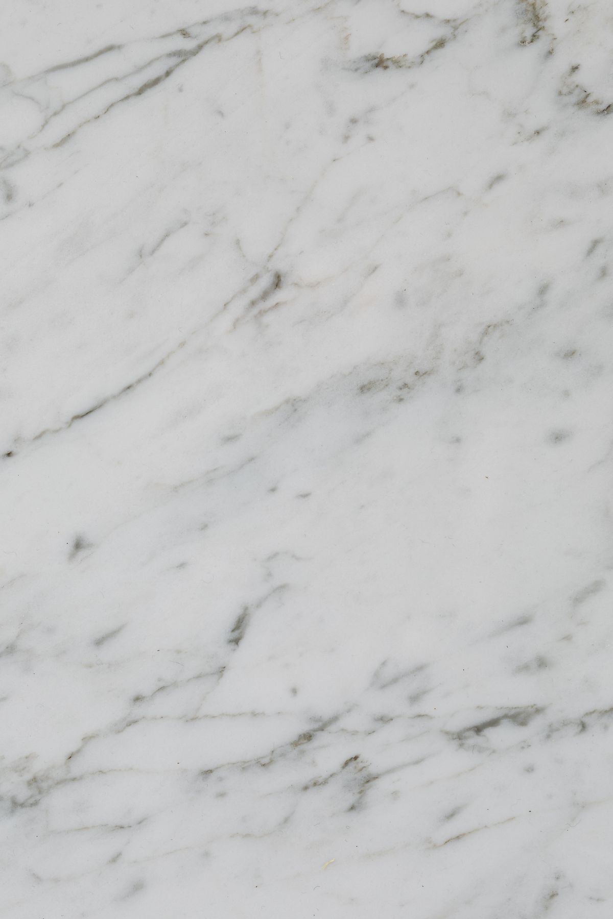 Subtle white marble with gentle green-grey veining