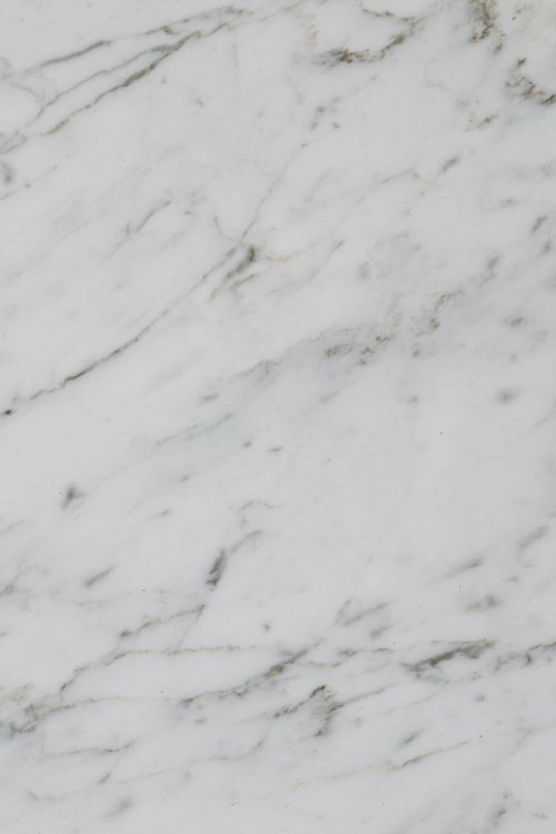 Free High-resolution image of white marble with distinct natural veining, ideal for backgrounds and textures. Stock Photo