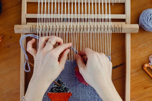 Female Weaver Weaving on a Loom