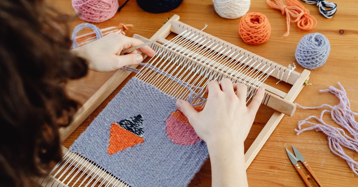 Weaver Using Loom Female Weaver Using a Weaving Loom · Free Stock Photo