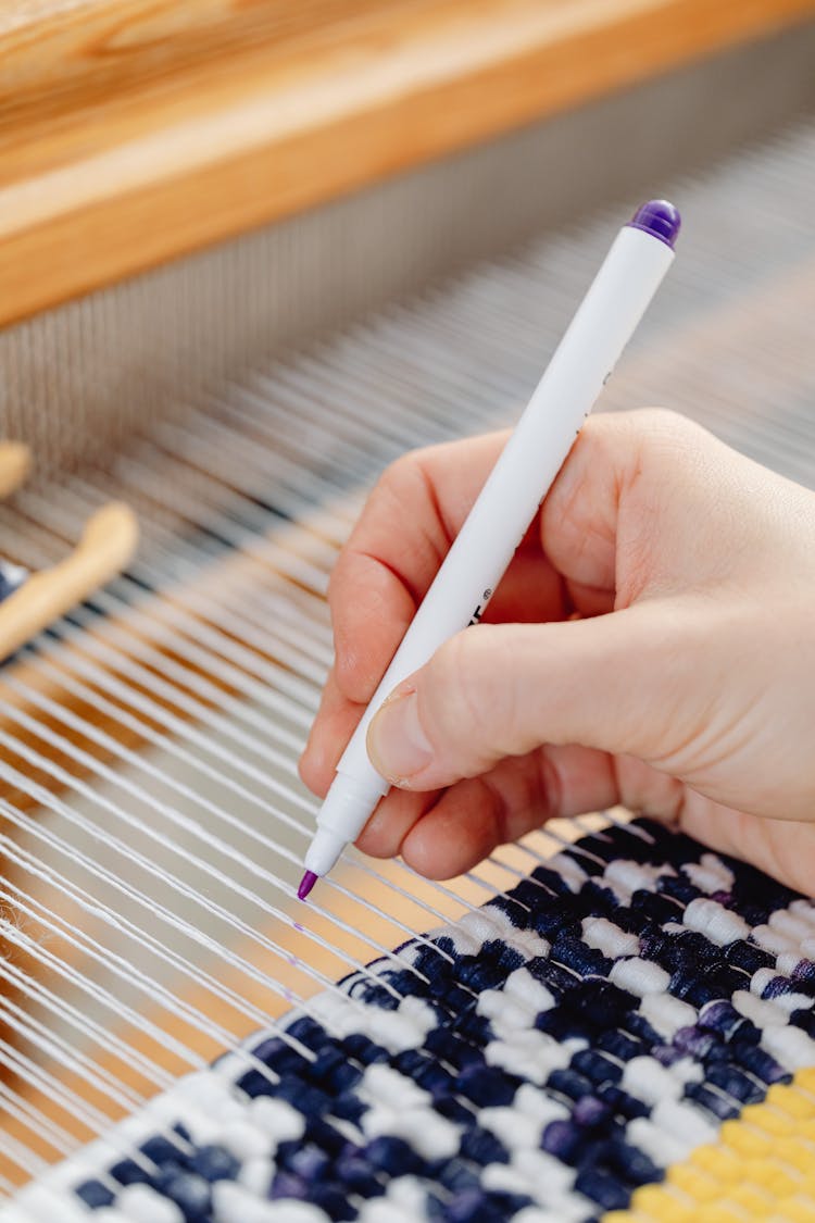 Close Up Of Woman Hand Marking Lines While Waving 