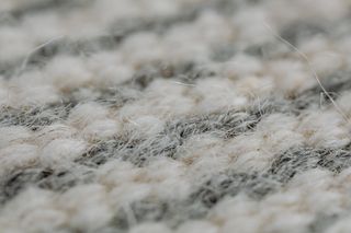 Close-up of a handwoven wool rug pile — photo by Kaboompics on Pexels