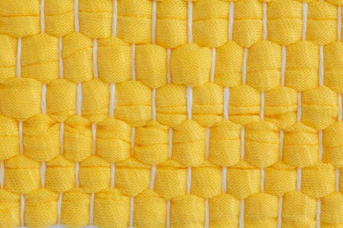 Free Yellow Yarn Woven in a Pattern Stock Photo