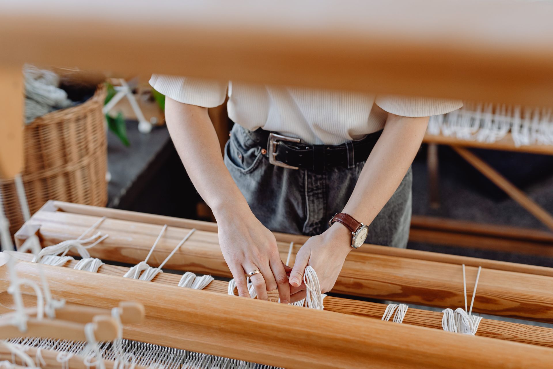 Woman Working on Weaving Fabric