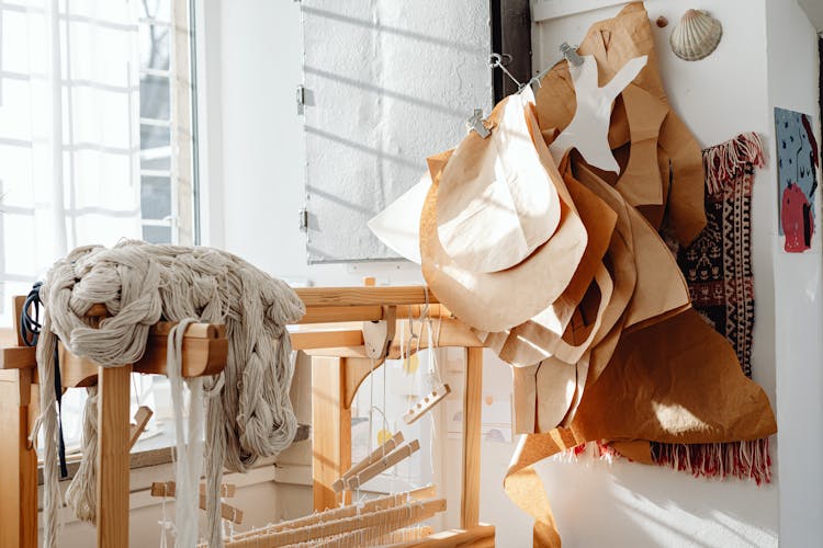 Fabric, Weave And Paper Cut Outs In A Workshop