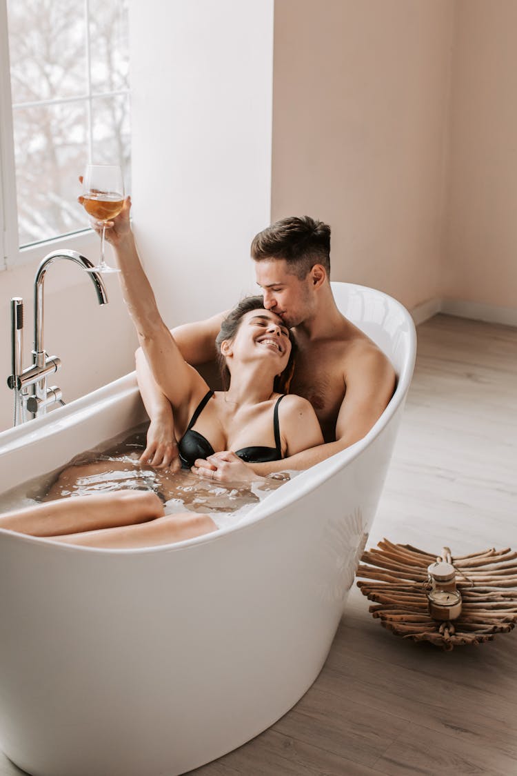 Man And Woman In Bathtub With Water