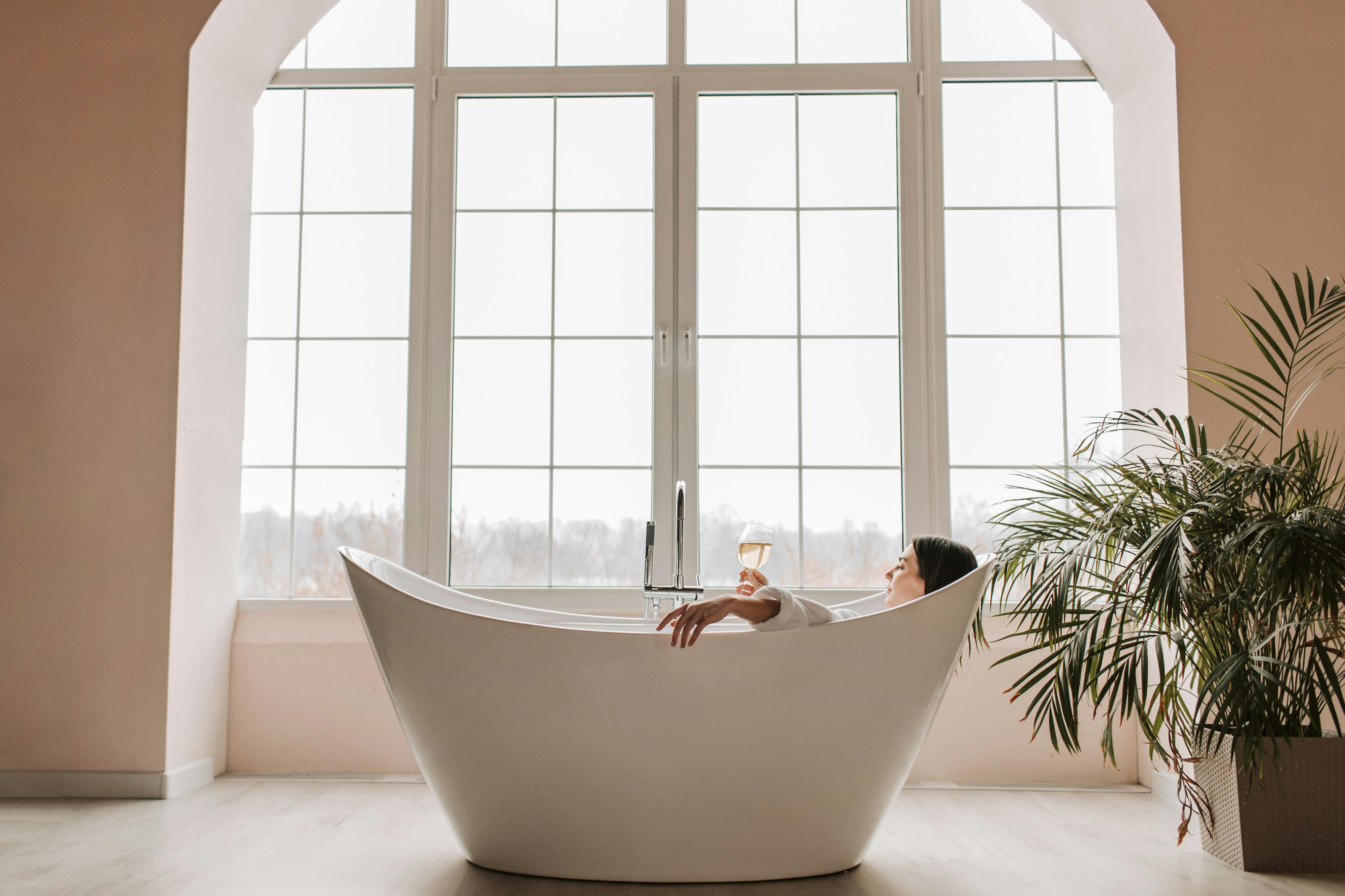 A woman relaxing in a bathtub