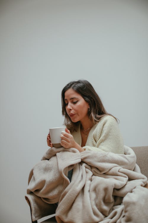 A Woman Having a Cup of Tea 