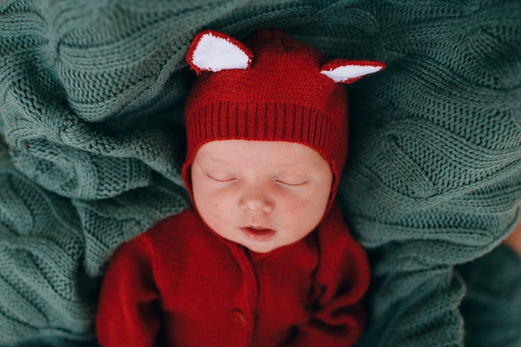 Happy Vulnerable Baby With Mouth Opened Sleeping