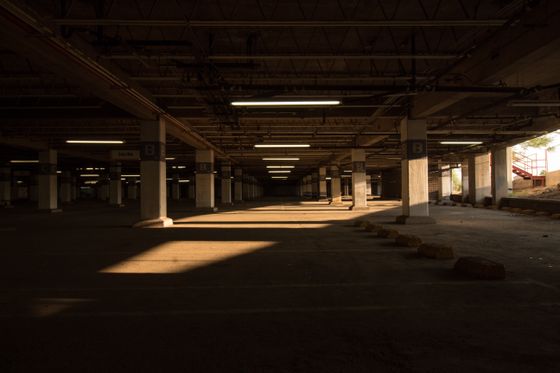 Sunlit empty parking structure — photo by Vero Andrade on Pexels