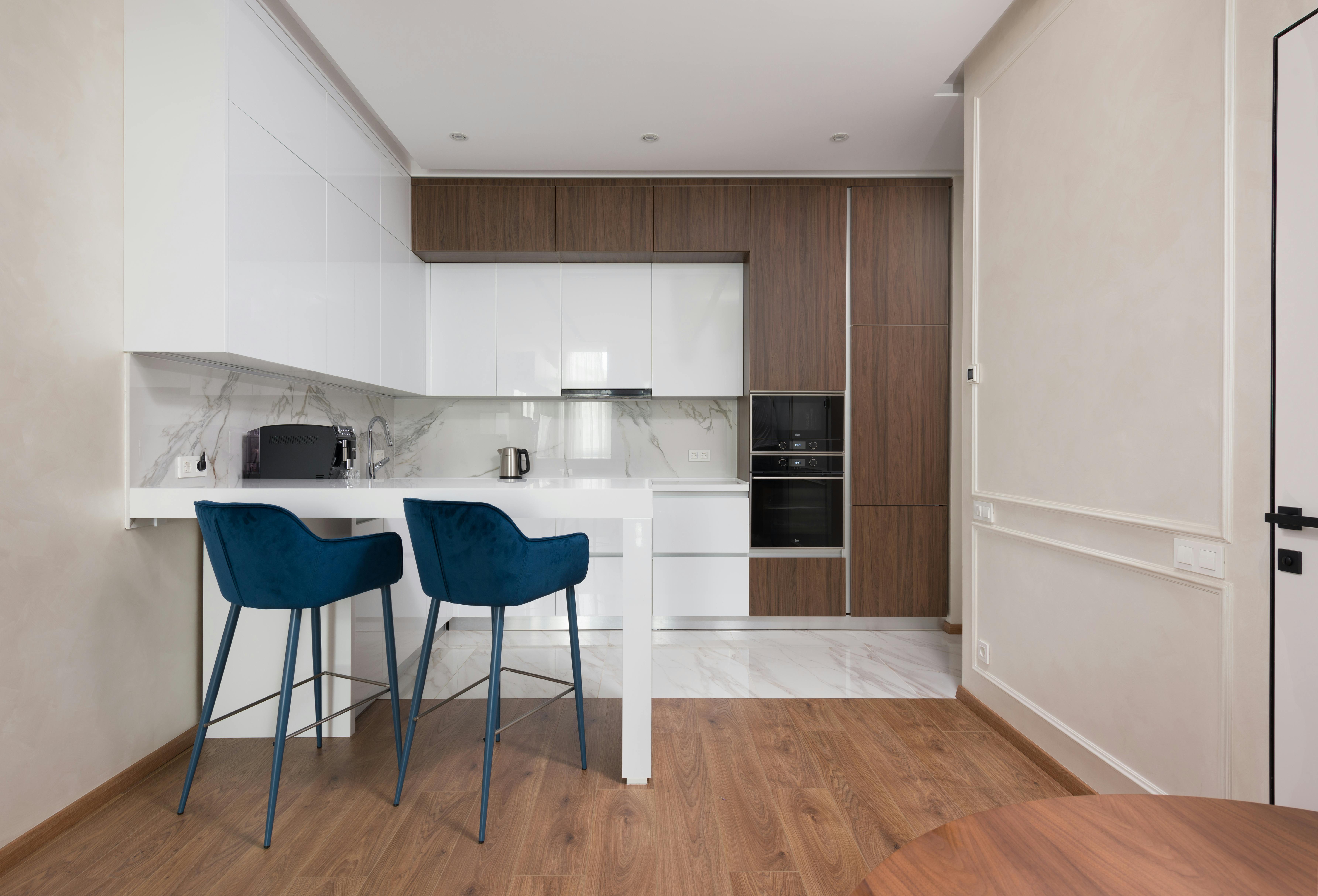 interior of modern open kitchen with furniture