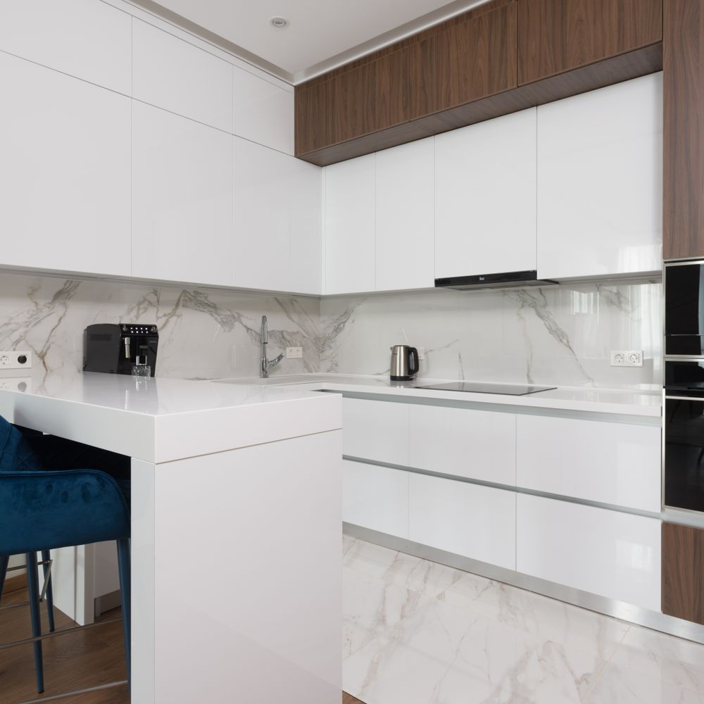 Kitchen Spraying in Bulls Cross — a decorator at work mid-project