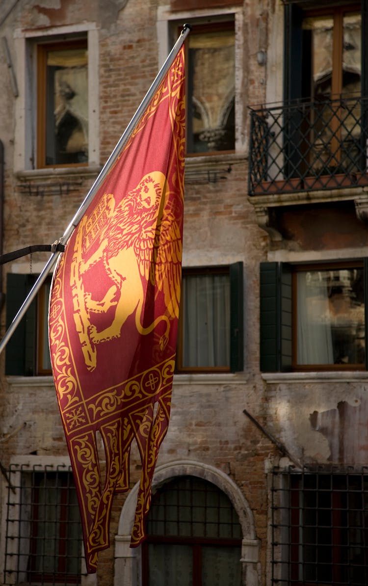 Red Flag Of Venice Showing A Winged Lion