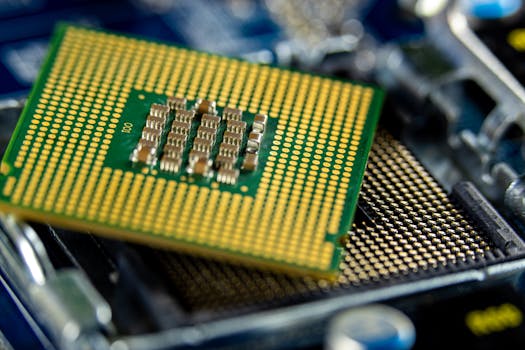 Detailed close-up of a microprocessor on a motherboard showcasing its intricate design.
