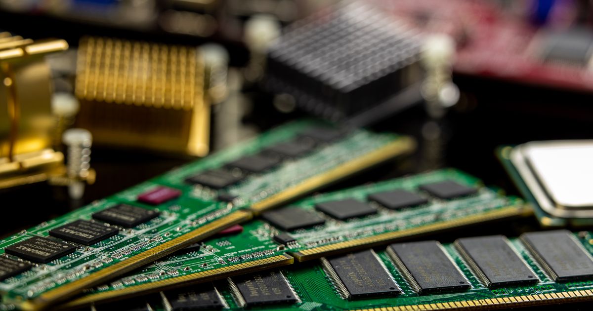 Detailed view of RAM sticks and microprocessors on a motherboard.