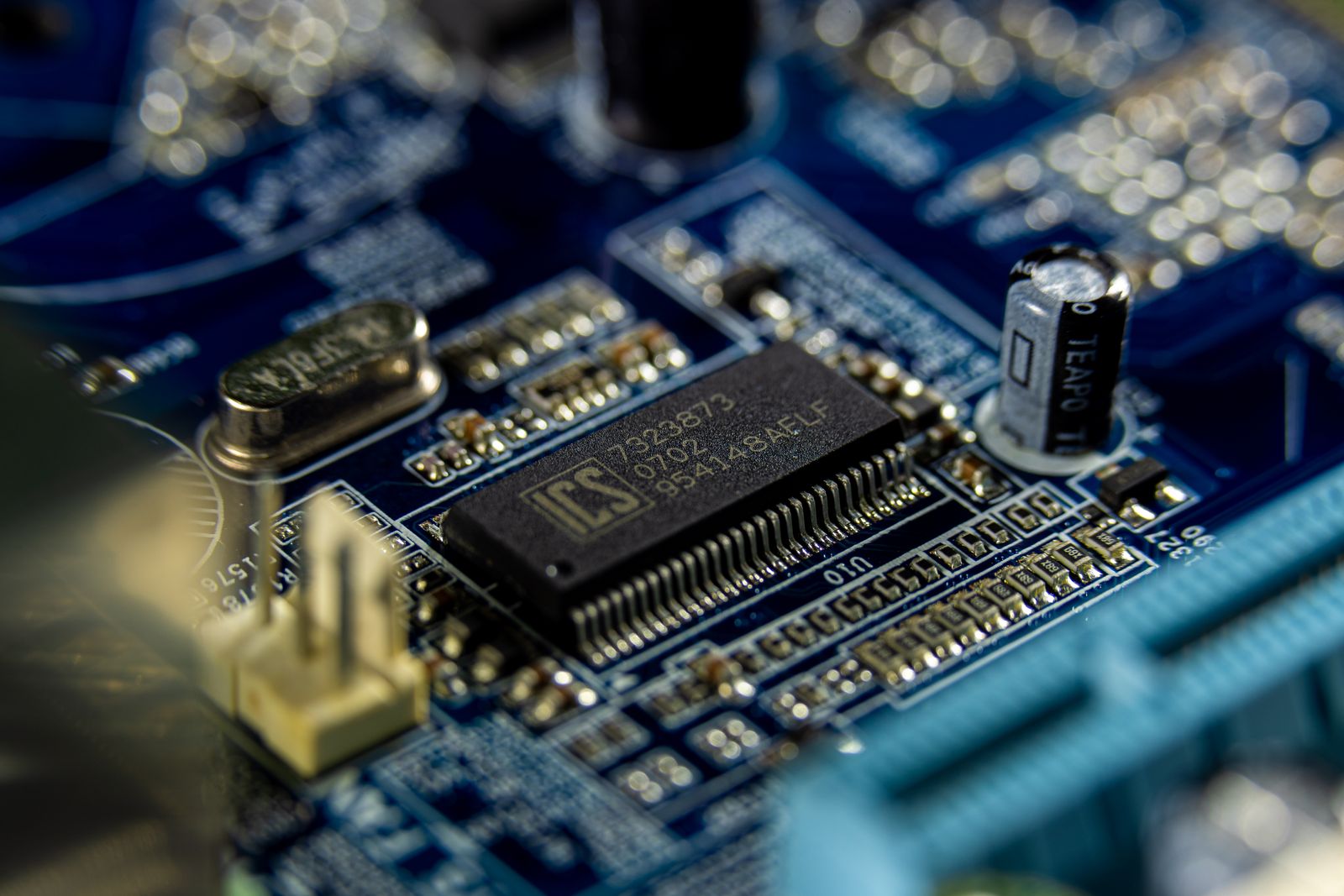 confidential computing implementation hardware enclaves: motherboard detail representing trusted hardware roots and enclave keys.