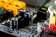 Black Capacitors On A Circuit Board
