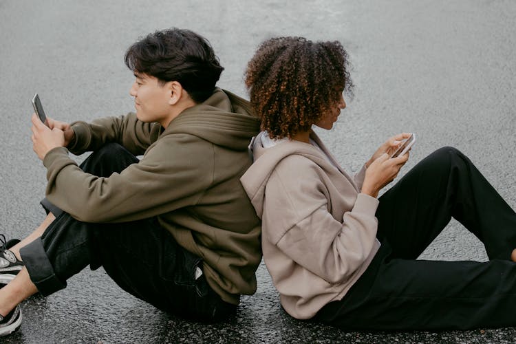 People Sitting On The Ground