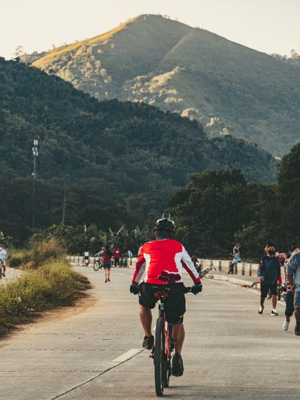 Rider descending a scenic mountain road — photo by John Ivan Cocjin on Pexels