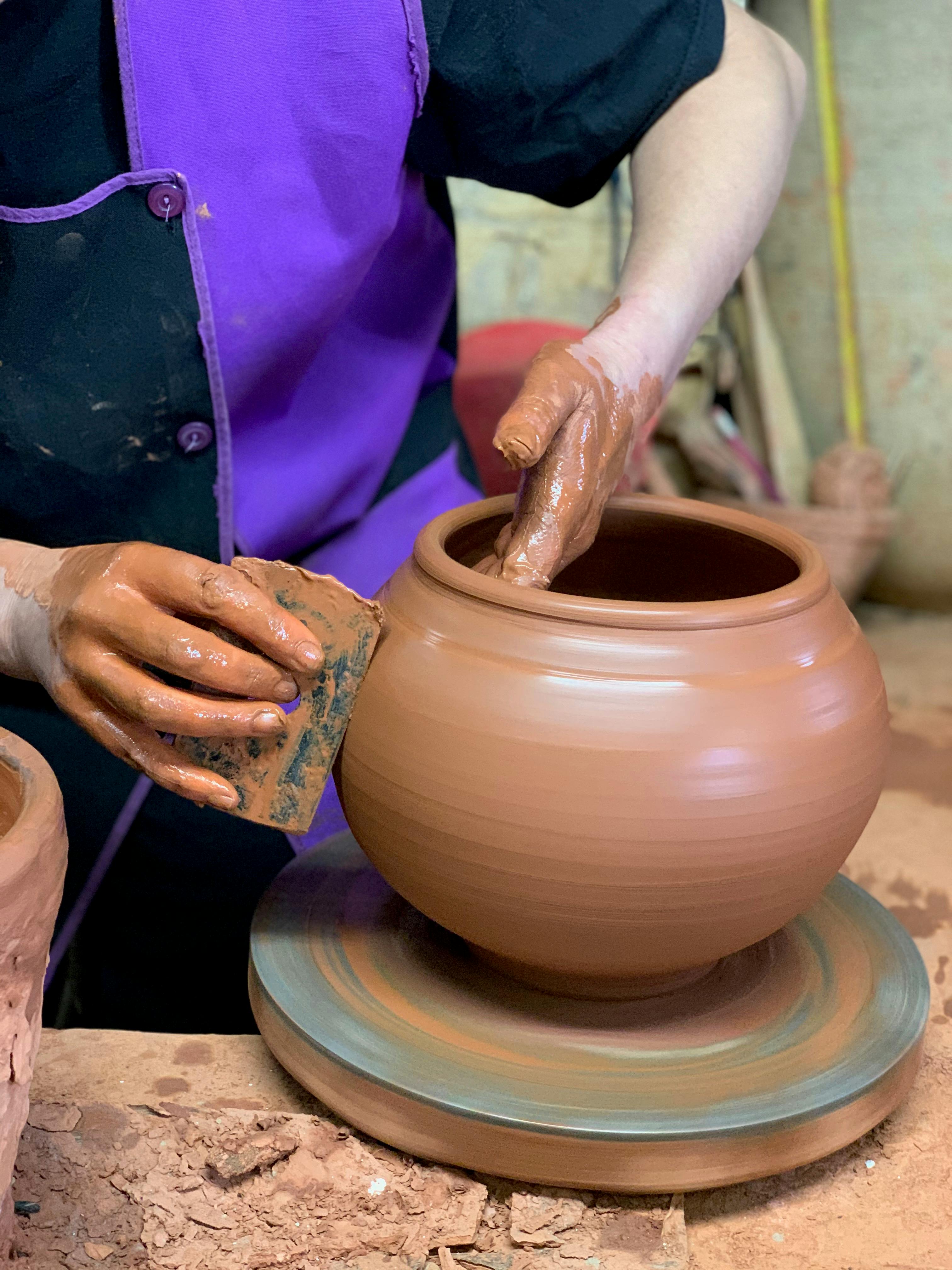 Girl Making a Clay Bowl on Sculpting Wheel Stock Photo - Image of material,  mentoring: 83556142