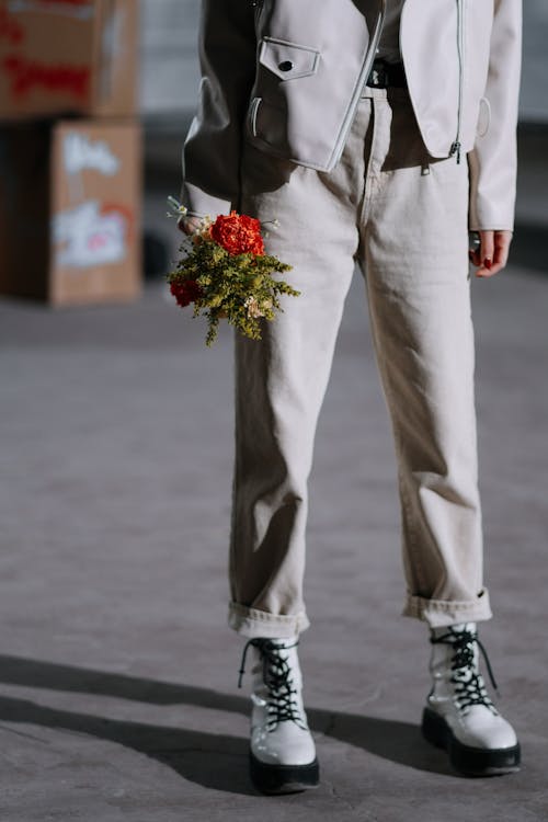 A Person Holding a Flower Bouquet