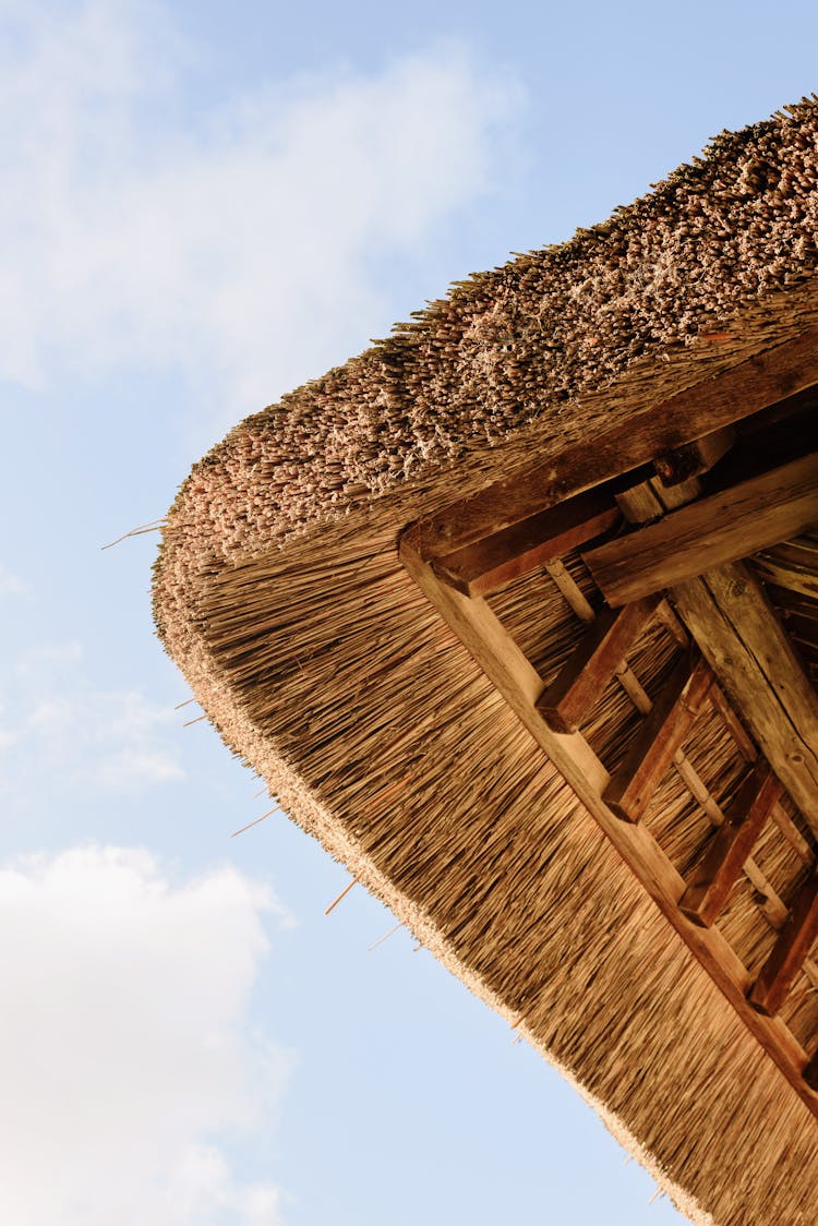 Low Angle Shot Of A Corner Of A Thatched Roof