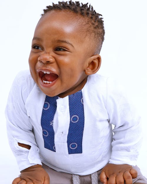 Free Smiling Toddler on White Background Stock Photo
