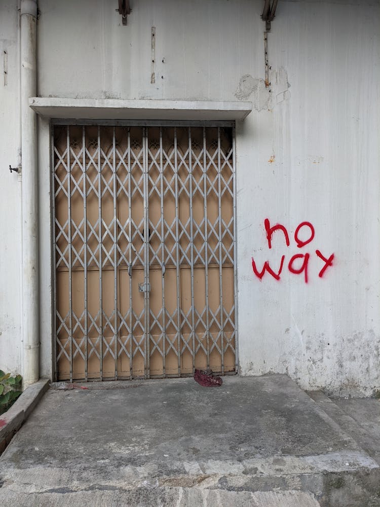 Barred Back Door To Building