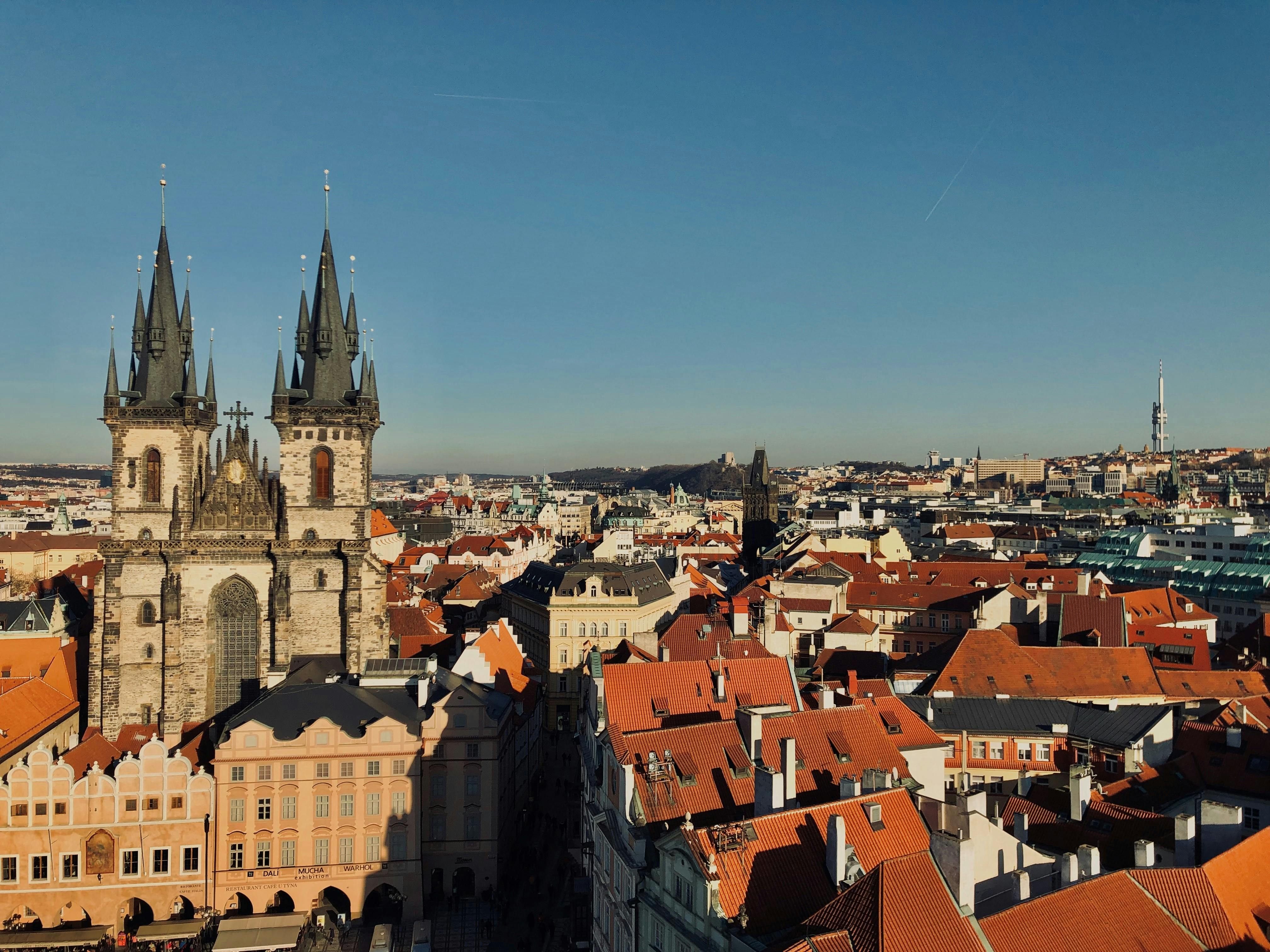 Stunning aerial view of Our Lady Before Týn Church amidst Prague's historic skyline.