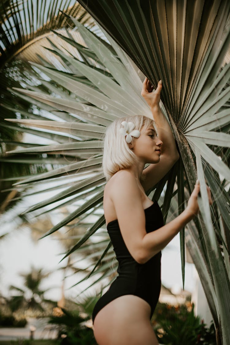 A Woman In Black Swimsuit