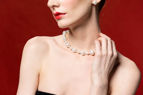 Free Pearl Necklace on Woman's Neck Stock Photo