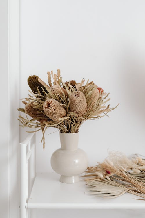 Brown Plants in White Ceramic Vase