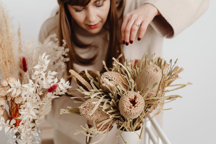 Woman Creating Floral Arrangements