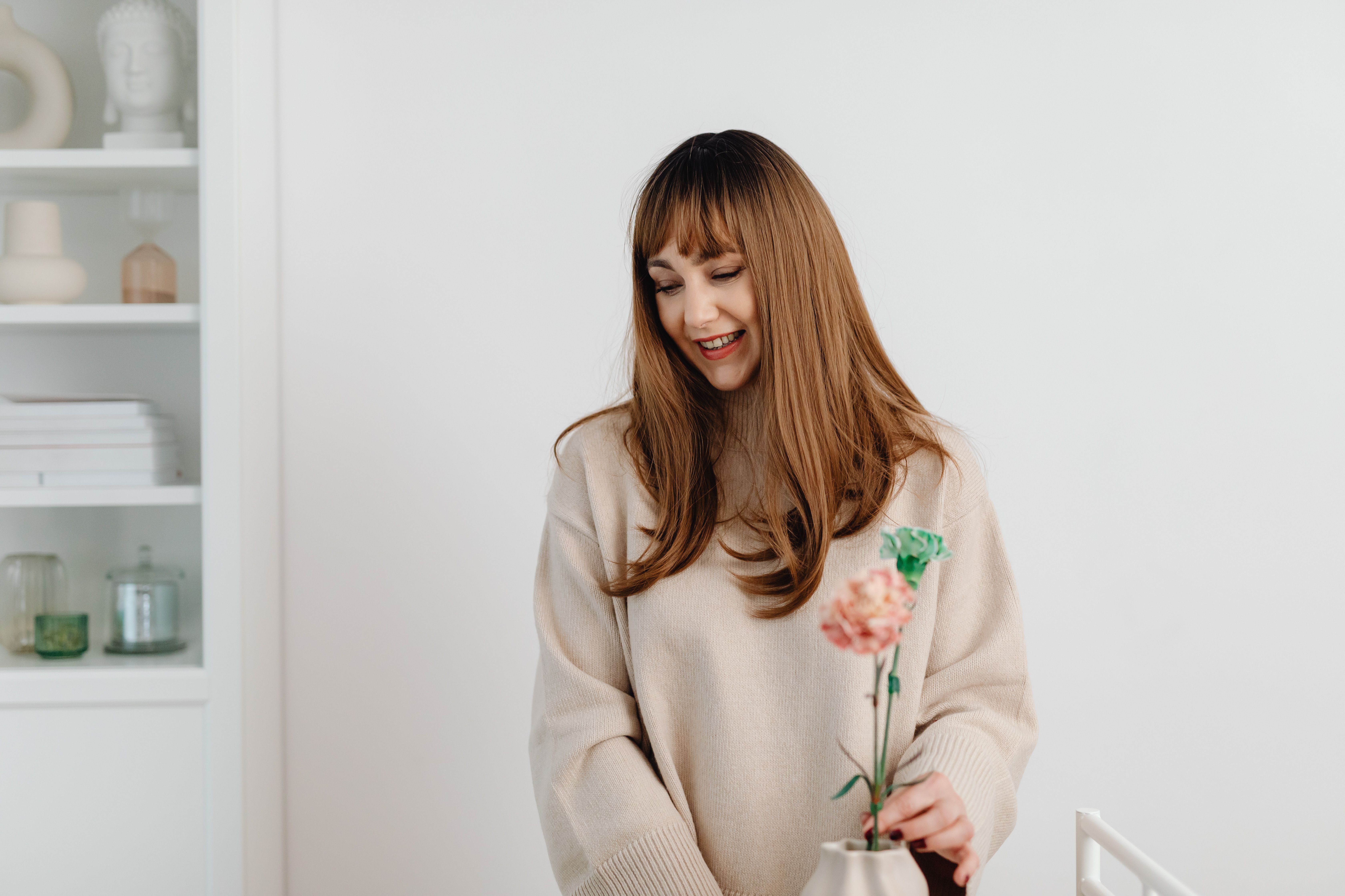 Smiling Woman with Flowers · Free Stock Photo