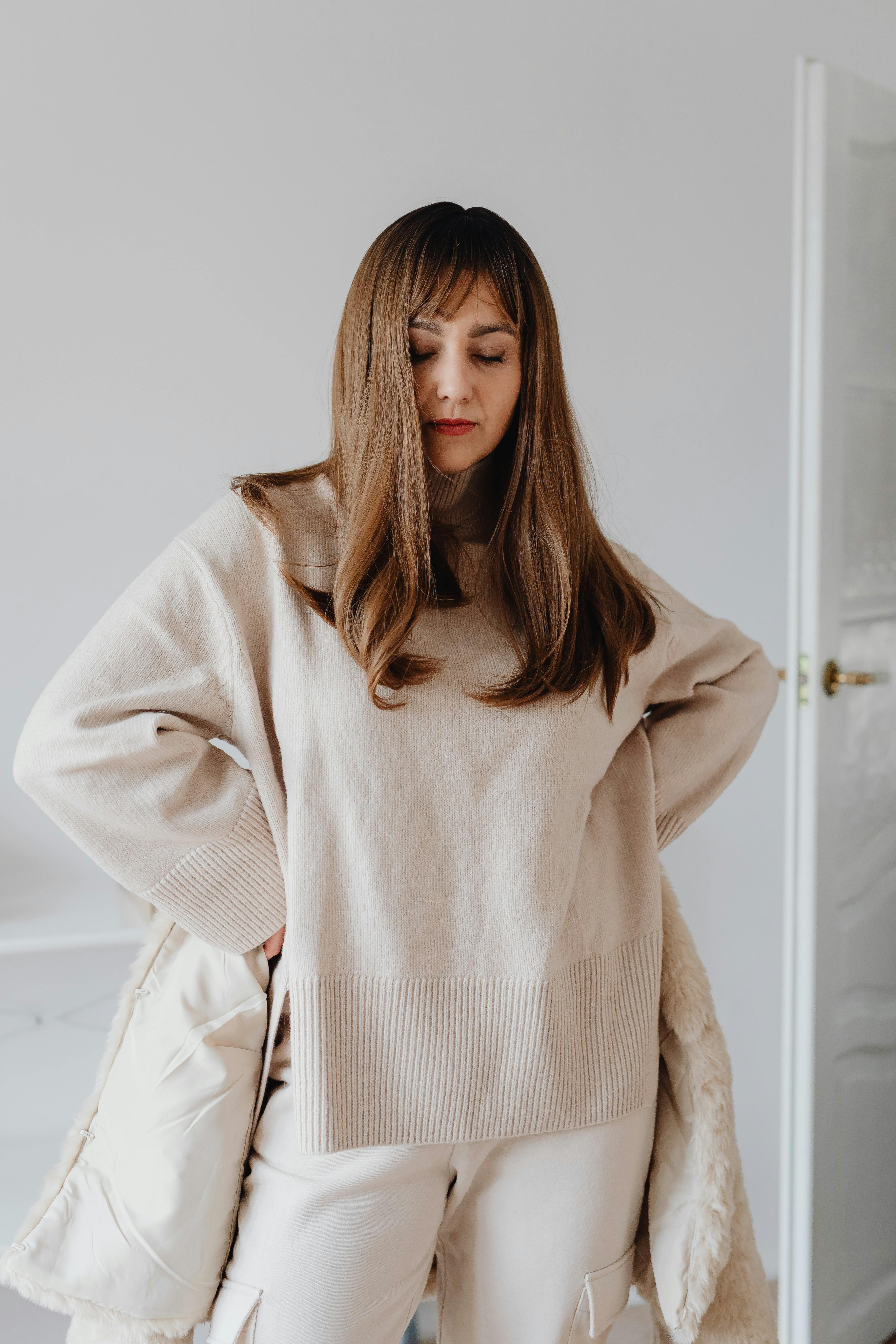 beautiful woman in a beige outfit