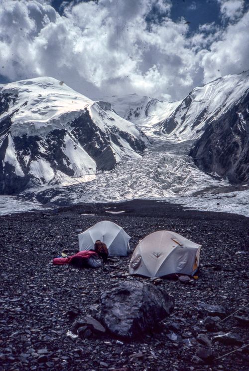 Free Tents in the snowy Pamir Mountains offer an adventurous outdoor camping experience. Stock Photo